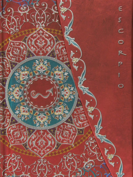 Libro Escorpio: Um caderno para anotaçäes importantes com capas em relevo e o signo de Escorpião inscrito. No interior a