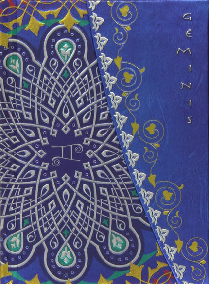 Libro Geminis: Um caderno para anotaçäes importantes com capas em relevo e o signo de Gémeos inscrito. No interior as pg