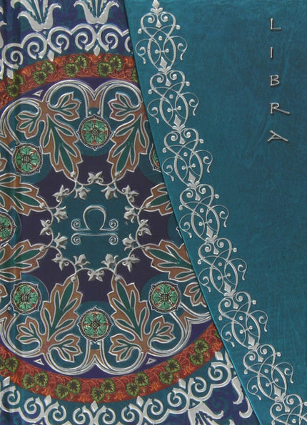 Libro Libra: Um caderno para anotaçäes importantes com capas em relevo e o signo de Balança inscrito. No interior as pgi