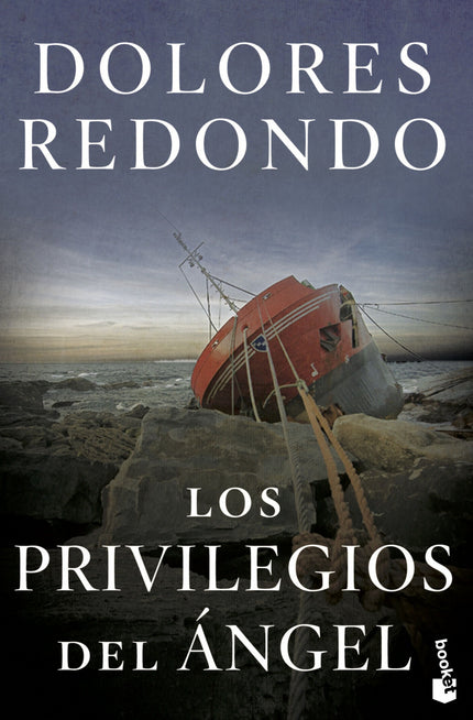 Libro Los Privilegios Del ángel: La primera novela de Dolores Redondo. En la humilde bahía pesquera de Pasajes, en los años 70, rodeada de muelles de pesca, estibadores, humedad y salazón, se forja una fuerte amistad entre Pakutxa y Celeste, dos niñas de cinco años.