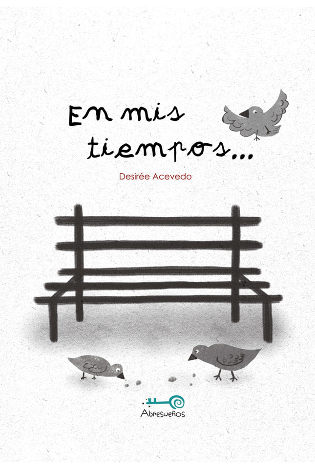 Libro En Mis Tiempos...: Un abuelo y su nieto están sentados en el banco de un parque. Los únicos sonidos que se cruzan entre ellos son los que produce la videoconsola del niño y las palomas que pululan alrededor del abuelo mientras éste les da de comer migas de pan.
