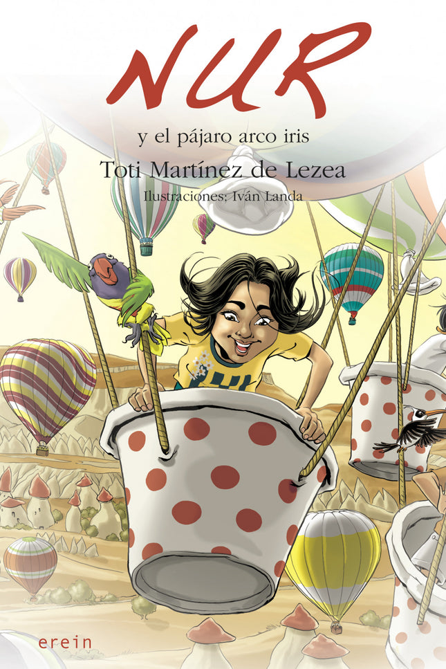 Libro Nur Y El Pájaro Arco Iris: Pronto serán las fiestas de Bilbao y Nur se encuentra de vacaciones en Larrabetzu. Una tarde, sus padres y ella, hacen planes para ir a las barracas.